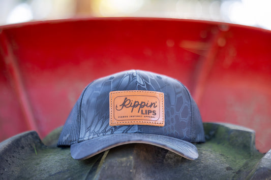 Rippin’ Lips - Kryptek Black Camo SnapBack